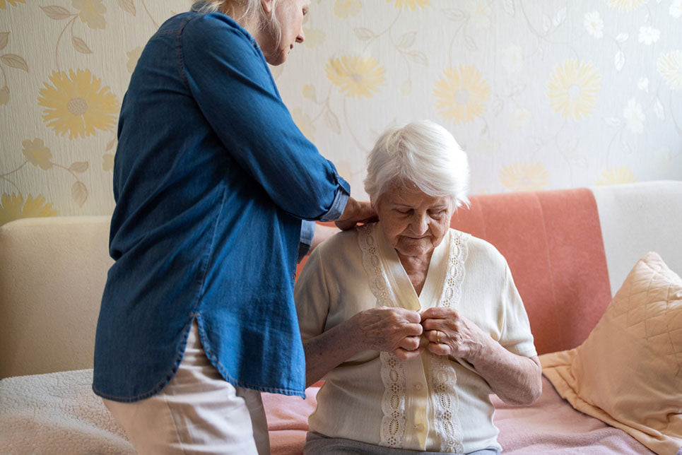 helping mom get dressed